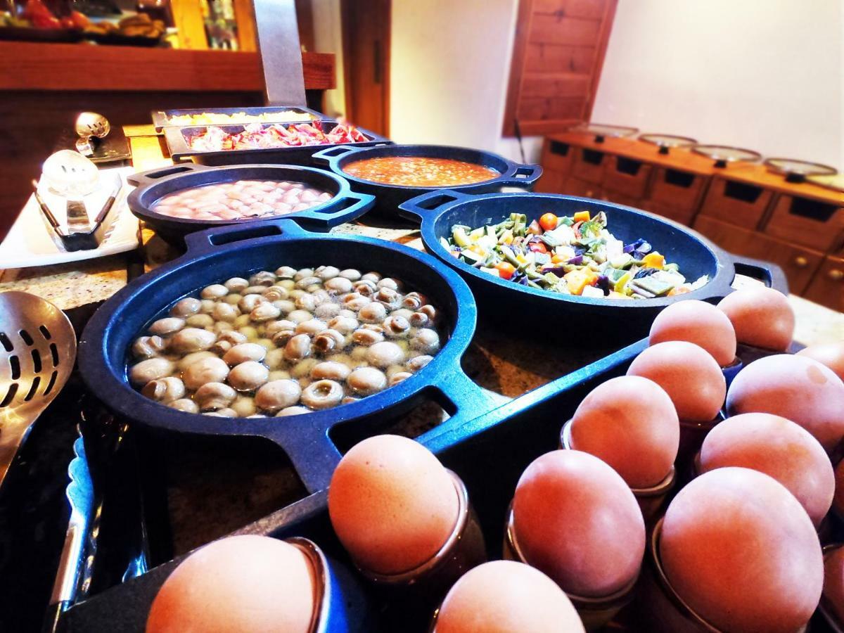 Hotel Apartamentos Bajondillo ตอร์เรโมลิโนส ภายนอก รูปภาพ Breakfast buffet at a hotel